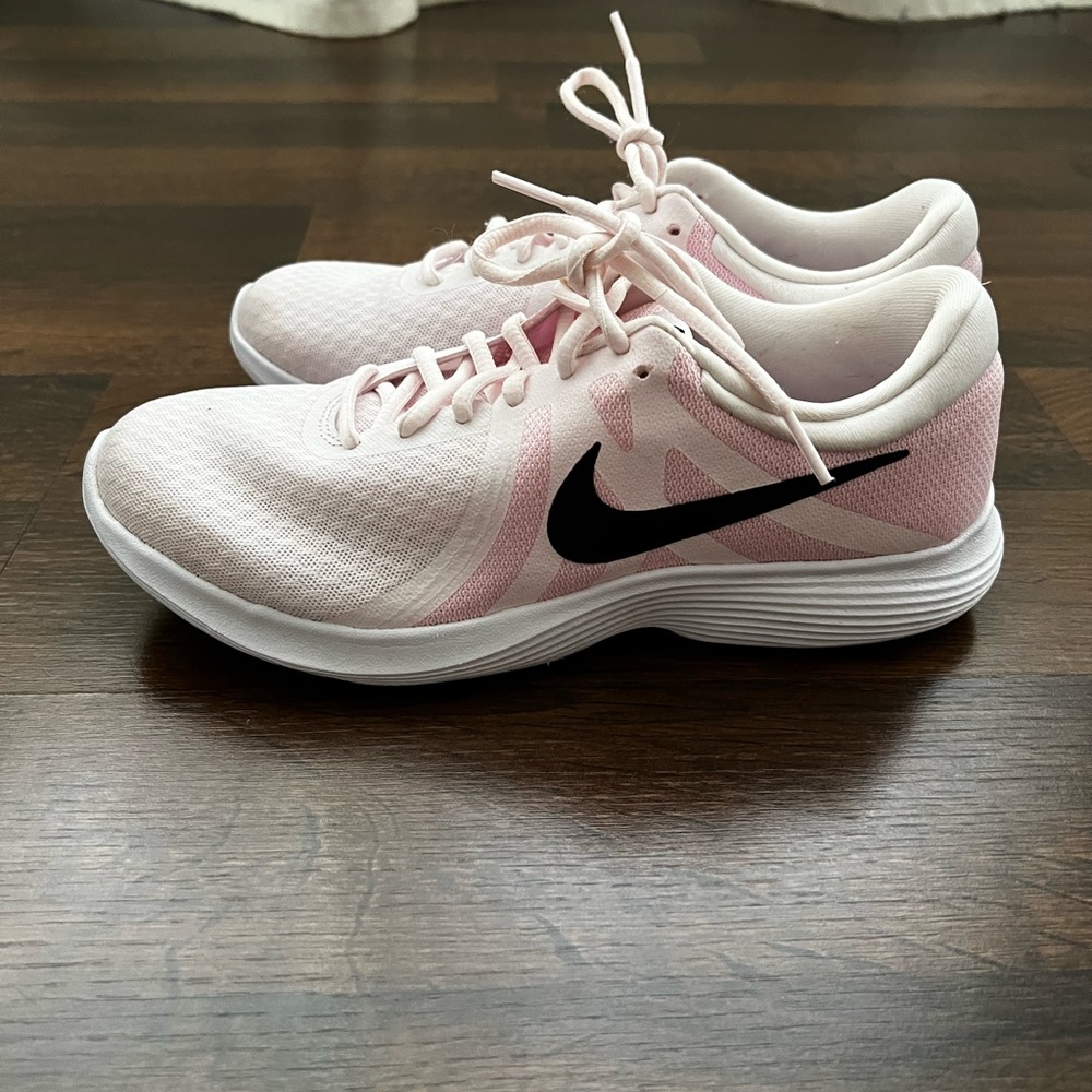 Nike Women’s Revolution 4 pale pink running sneakers